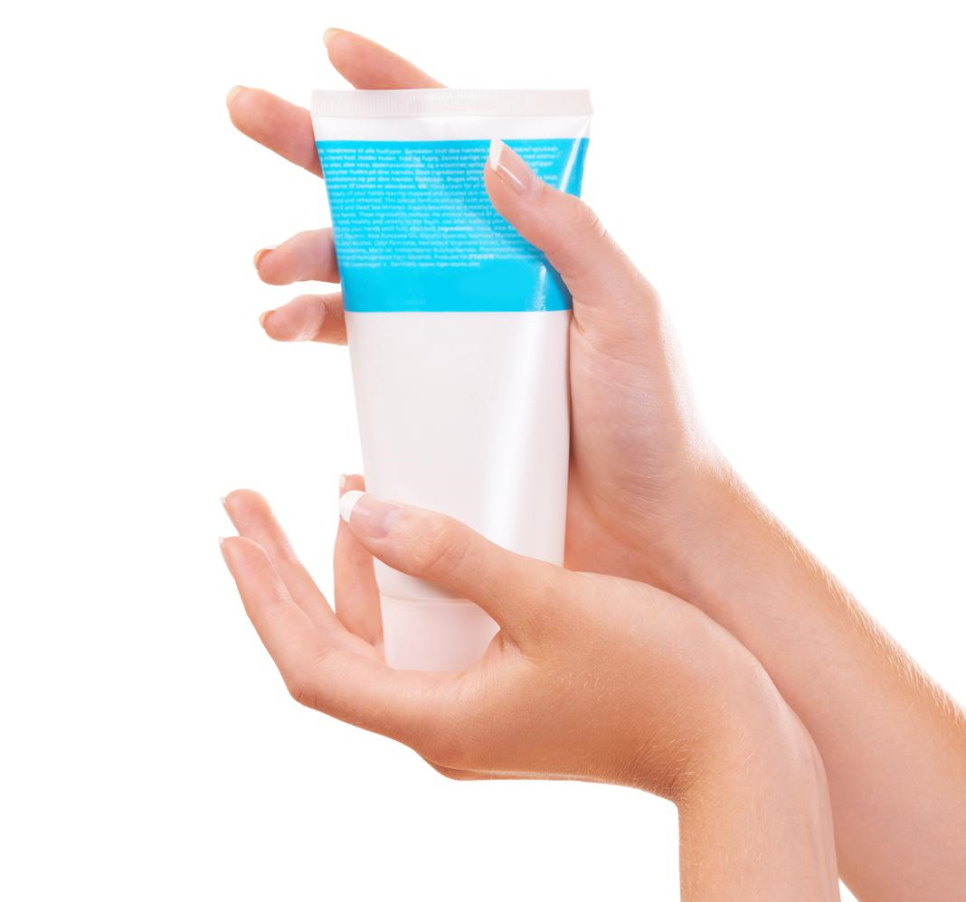 49154684_this-product-is-a-great-way-to-keep-your-skin-healthy-a-woman-holding-a-tube-of-hand-cream.jpg